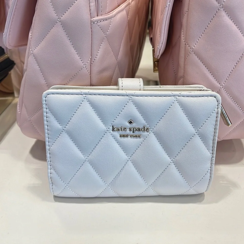 Kate Spade Carey Medium Compartment Bifold Wallet  COLOR: Parchment